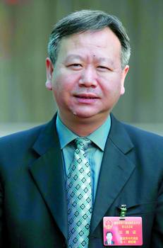 与国际接轨的旅游管理体系 访张家界市市长胡伯俊