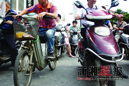 区别电动车和电动自行车:有脚踏功能的才是电