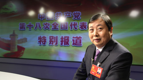 十八大代表，江苏省江阴市华西村党委书记、华西集团董事长吴协恩(闫微微摄)