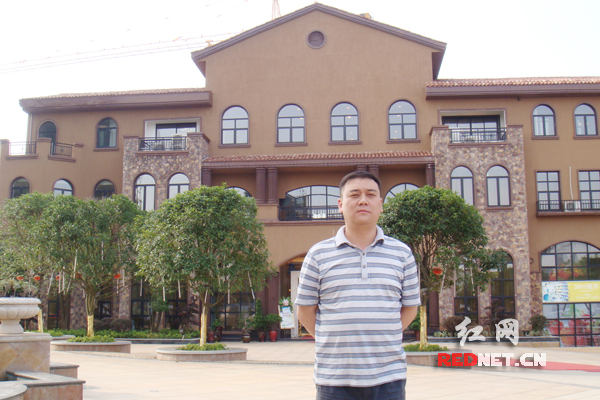 永州市宏一房地产开发有限公司董事长兼总经理周刚。