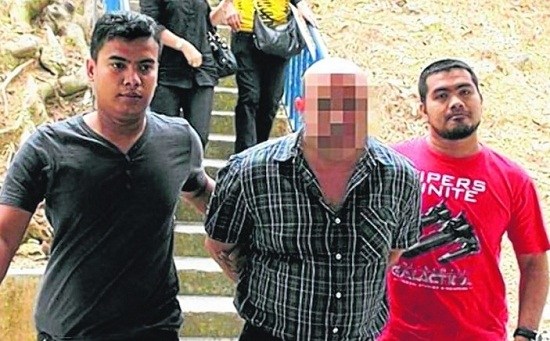 马来西亚警方逮捕东南亚最大人口贩卖头目（图）