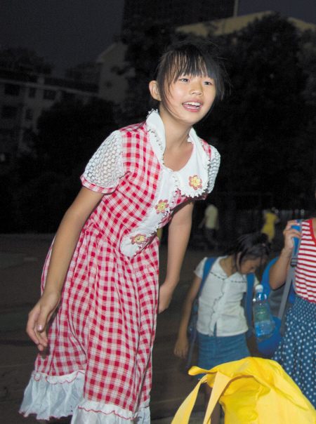 11岁的靖州女孩小杨第一次来长沙,感到很兴奋.邹麟摄
