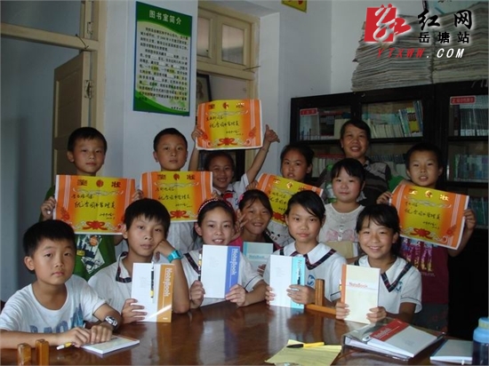 唐育新：扎根农村乐其中，献身教育终不悔