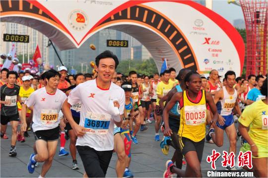 伦敦奥运冠军陈定领衔2万人征战2013广州马拉松