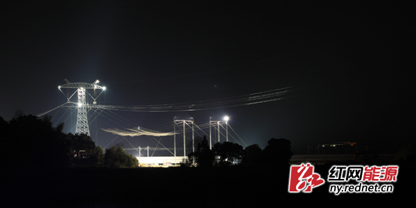 溪浙特高压工程湘6标段跨越高铁施工现场。