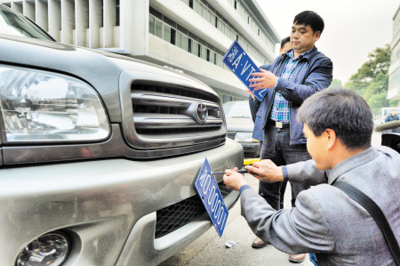 湘0·00001车牌正式退役 省委车队车辆集中更