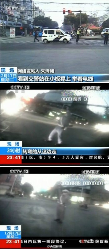 [视频]实拍交警寒夜举光缆5小时 网友赞托举哥