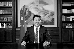 国家主席习近平在办公室发表二一四年新年贺词。新华社记者 兰红光/摄