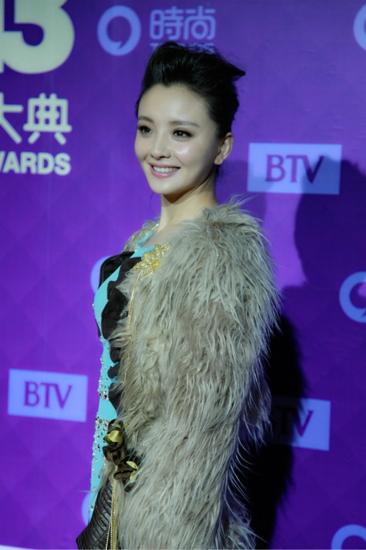 孙茜带病出席盛典 与郭培打造“旧衣新时尚”