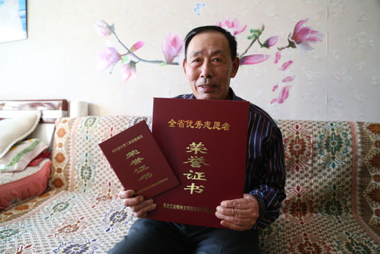 李俊熠:20年持之以恒 雷锋战友传承“雷锋精神”