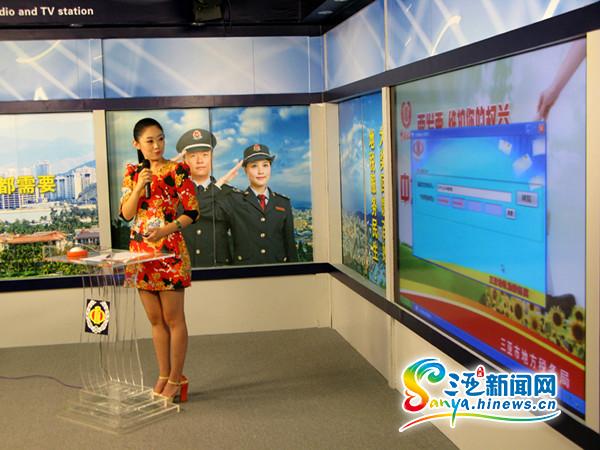 三亚市地税局举办的2014年发票摇奖活动第二期开奖现场(三亚新闻网记者 刘丽萍 摄)