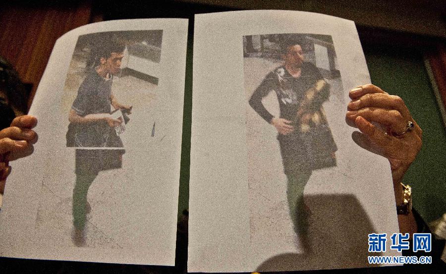 图为马来西亚官方3月11日公布的冒用护照嫌疑人照片。左为19岁伊朗男子，右边照片主人身份还不确定。当日，马来西亚方面在吉隆坡国际机场附近的一家酒店召开新闻发布会，之后公布了两张马航失联客机上冒用护照嫌疑人的照片。其中一名是19岁伊朗男子，其目的是移民德国。新华社记者何靖嘉摄 