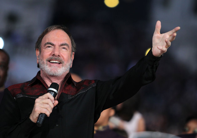 英女子手机下载歌曲 银行卡竟被扣数千英镑