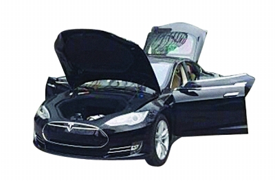 特斯拉汽车有流线外形。 图片由车主提供