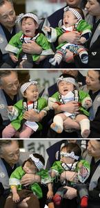 日本“啼哭相扑大会”:萌娃赛场展“哭颜”(图)