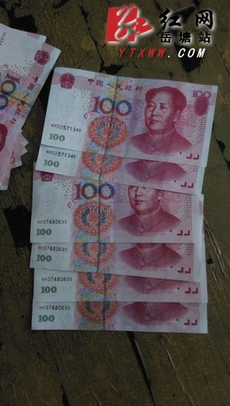 八旬老人领回千元假钞 新建社区联系民警调处