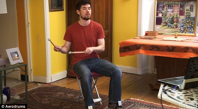 “空气鼓”问世看不见摸不着可敲出鼓声(图)