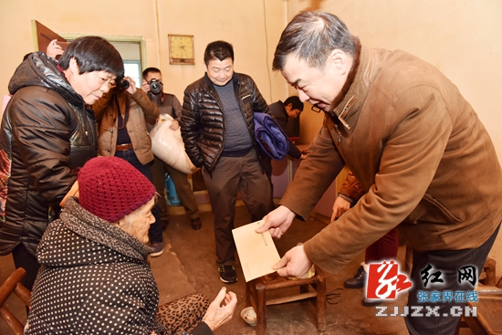 高建国一行深入慈利县永盛村开展春节慰问活动