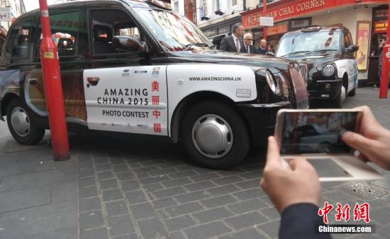 50辆喷绘有“美丽中国”照片图案的英国出租车走上伦敦街头，成为一道引人瞩目的亮丽风景线。 <a target='_blank' href='http://www.chinanews.com/'><p  align=