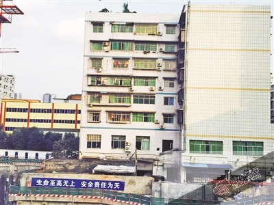 小区墙体开裂塞得进五根手指业主夜难眠（图）