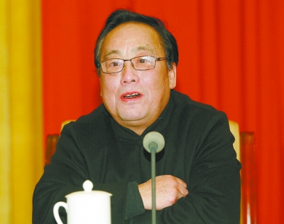 唐浩明。
