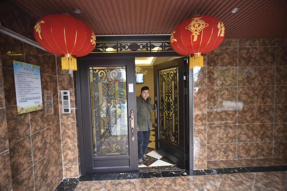 成都23户业主众筹40万 老小区变身“星级酒店”