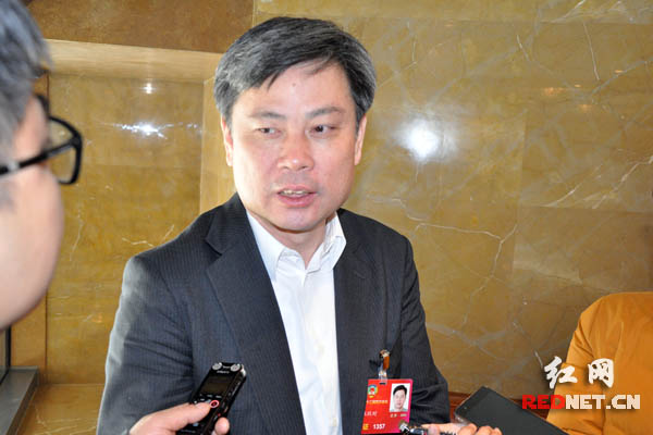 全国政协委员、隆平高科股份有限公司董事长伍岳时。