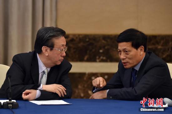 谢伏瞻（右）。 <a target='_blank' href='http://www.chinanews.com/'>中新社</a>记者 金硕 摄