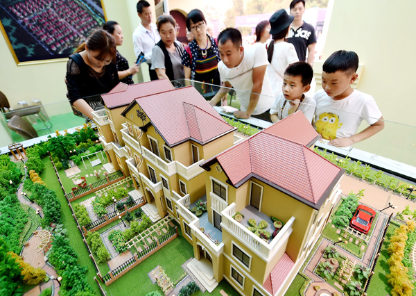 Li urges action on urban housing