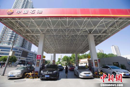 中国成品油价迎年内第四次上调
