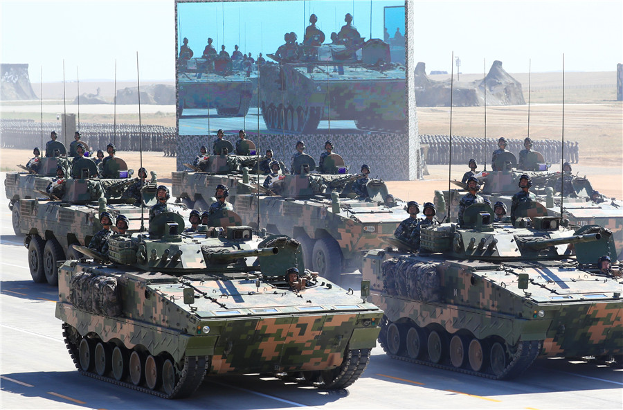 Xi inspects troops as China's military might on show