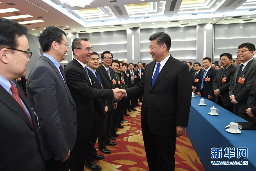 习近平下团组激发团结奋进正能量