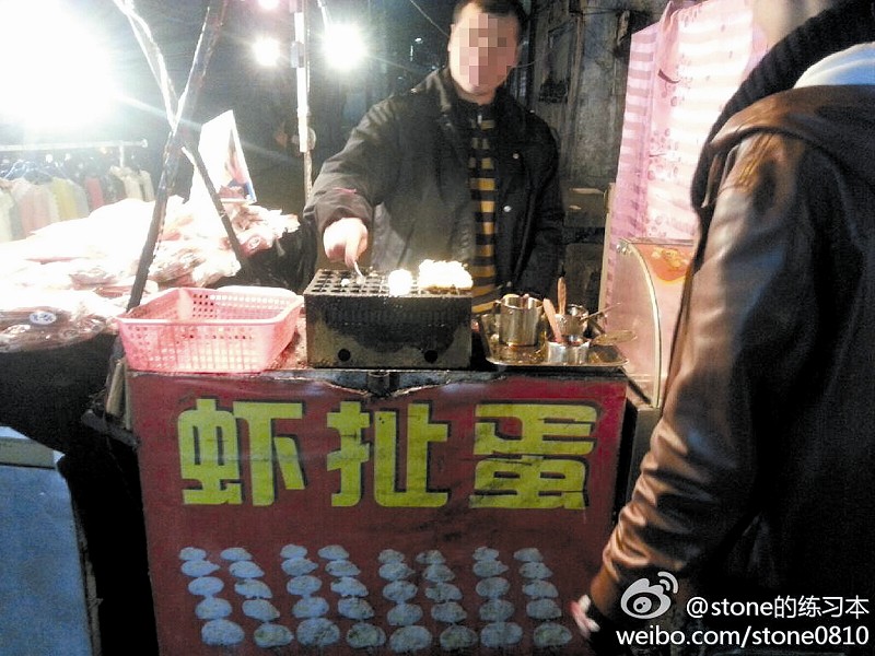 武汉一夜市小吃取名"虾扯蛋" 工商建议最好不用